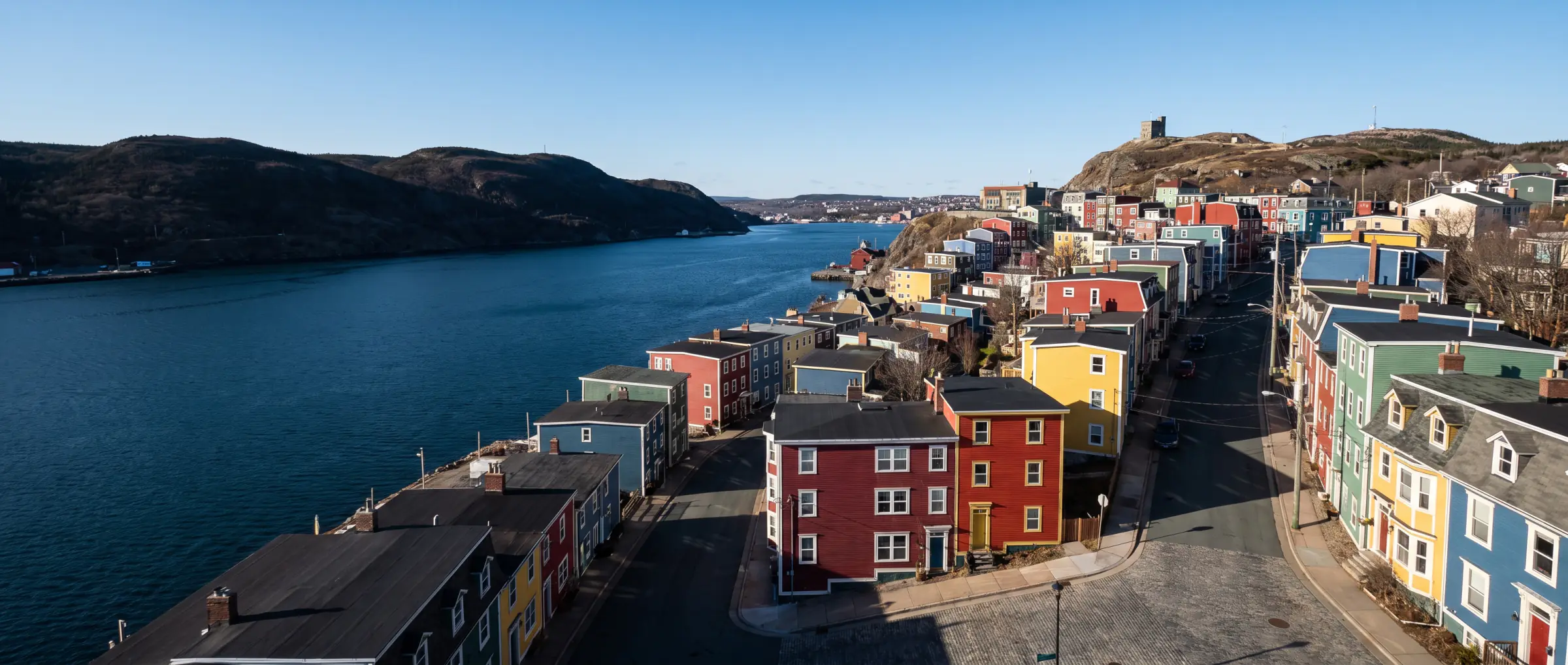 The painted row houses of Jellybean Row in St. John's below Signal Hill, Newfoundland and Labrador
