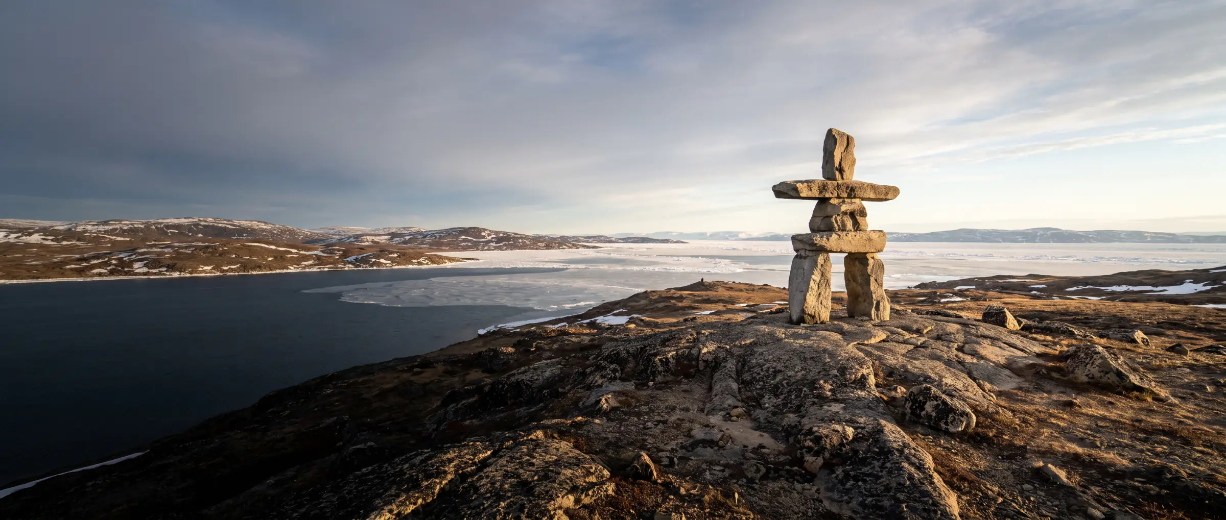 An inukshuk on the tundra above Frobisher Bay, Nunavut