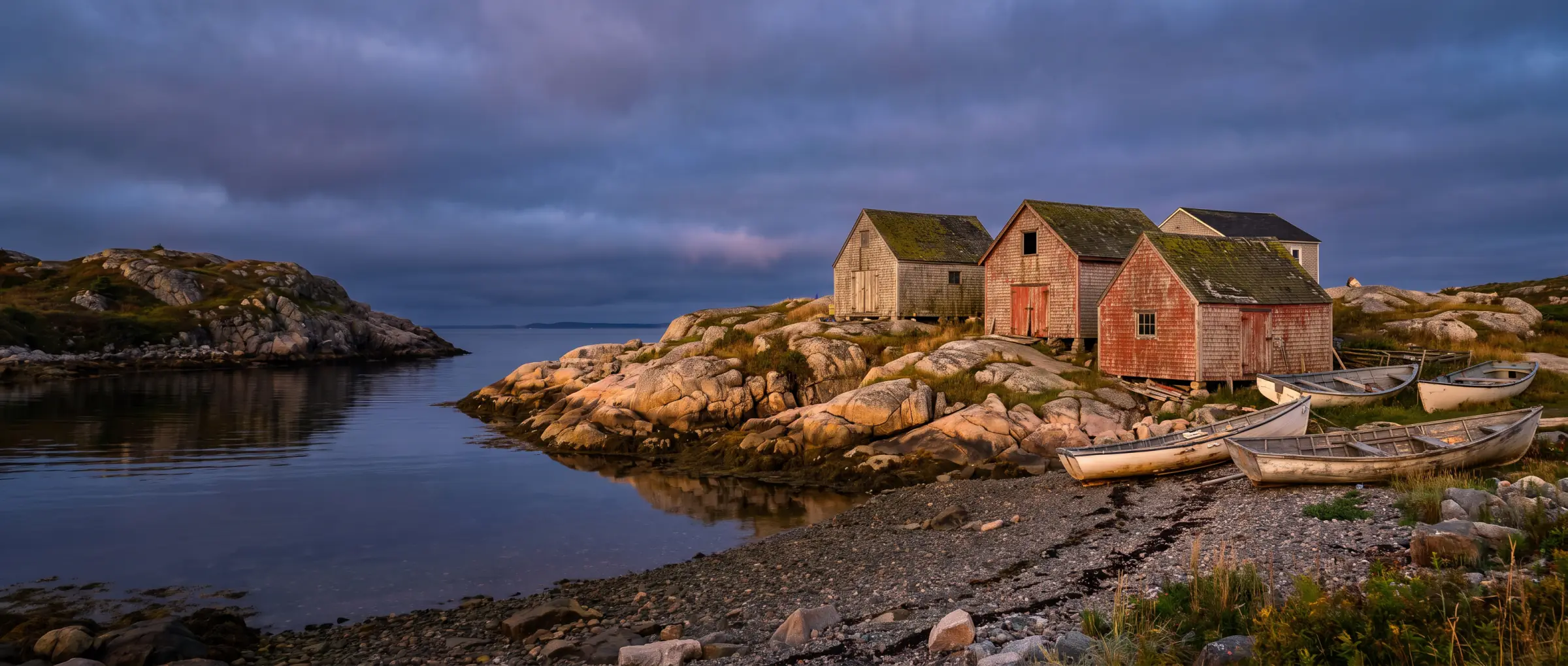 Christian-Owned Businesses in Brookside, NS: a granite cove with fishing sheds on the coast west of Halifax