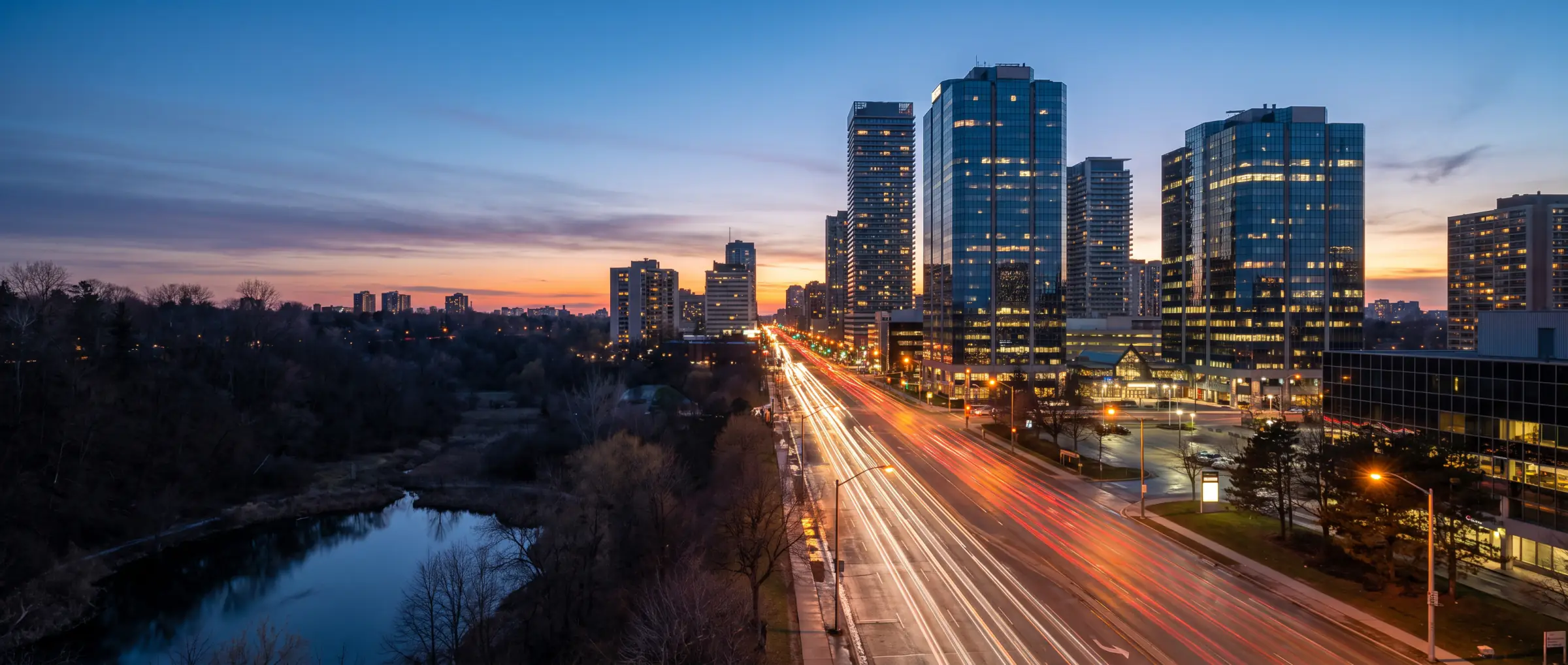 Christian-Owned Businesses in North York, ON: the North York Centre towers along Yonge Street at dusk