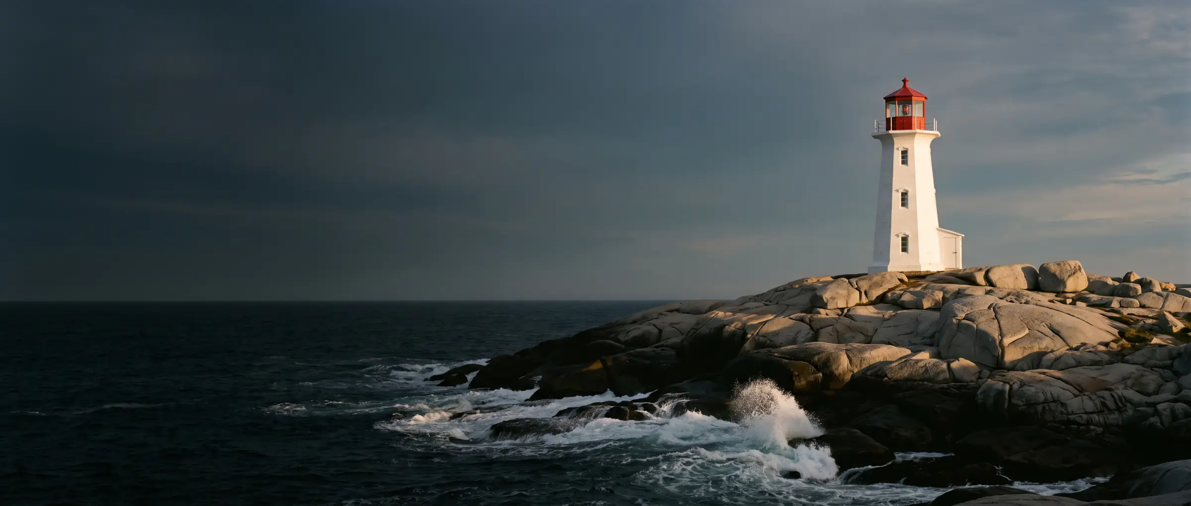 The Peggy's Cove lighthouse on its granite shore, Nova Scotia